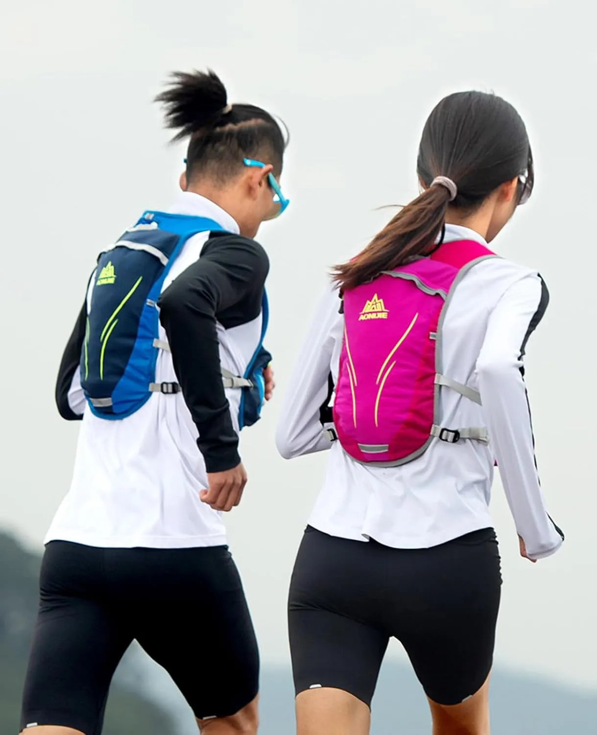 TRIWONDER Running Hydration Vest with Water Bottles Hydration Backpack Packs, Water Bladder BPA Free Leakproof for Triathlon Marathon Hiking Cycling Sport Gym Runner Water Bottles